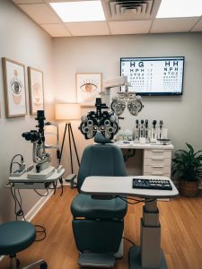 modern eye exam room with advanced equipment and a comfortable chair 47e7adc9 32a0 4a1f 8db3 48948c722bff Premier Optical